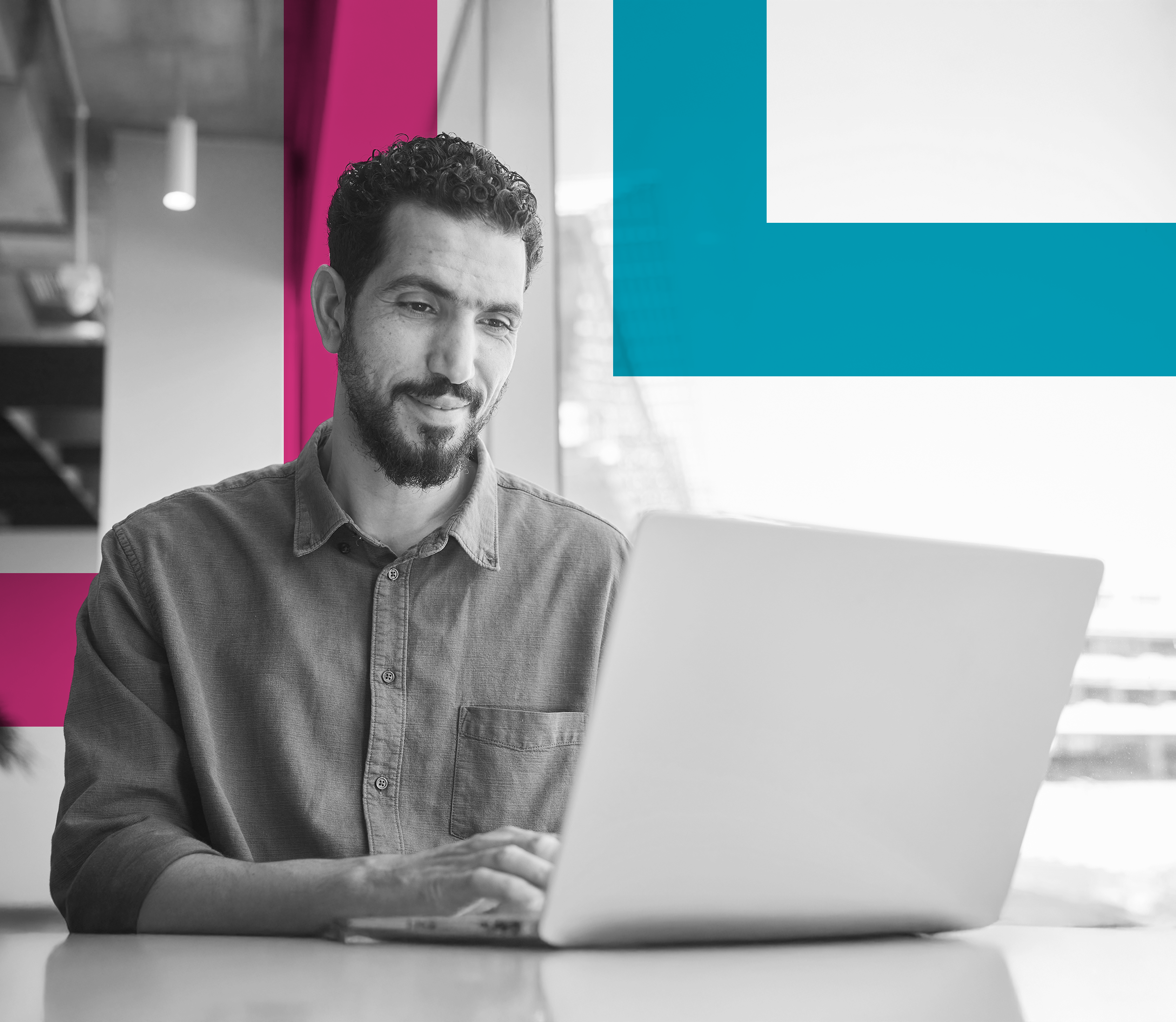 SINGLE-IMAGE_squares-smiling-young-businessman-working-on-a-laptop_may25